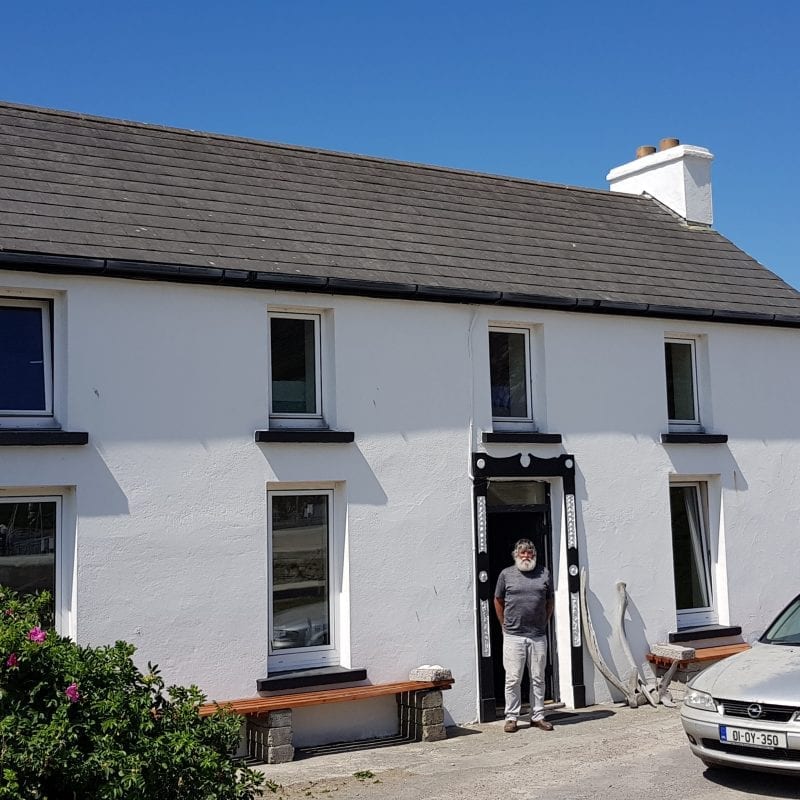 Steve Wing Cape Clear Wildlife Officer in doorway of CCBO