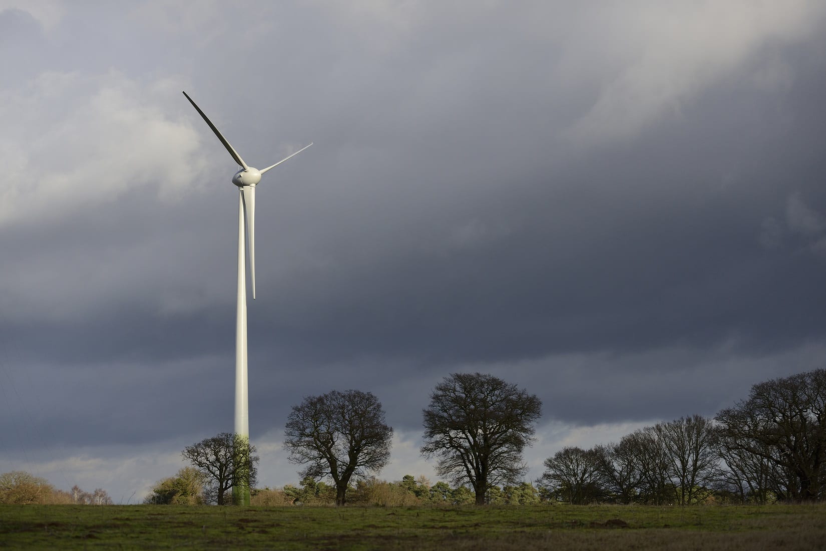 wind-turbine-against-dark-sky